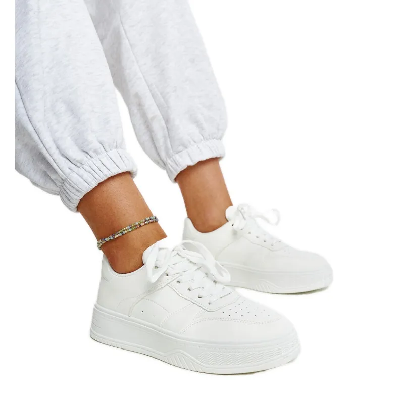 White sneakers with a thick sole from Rafida