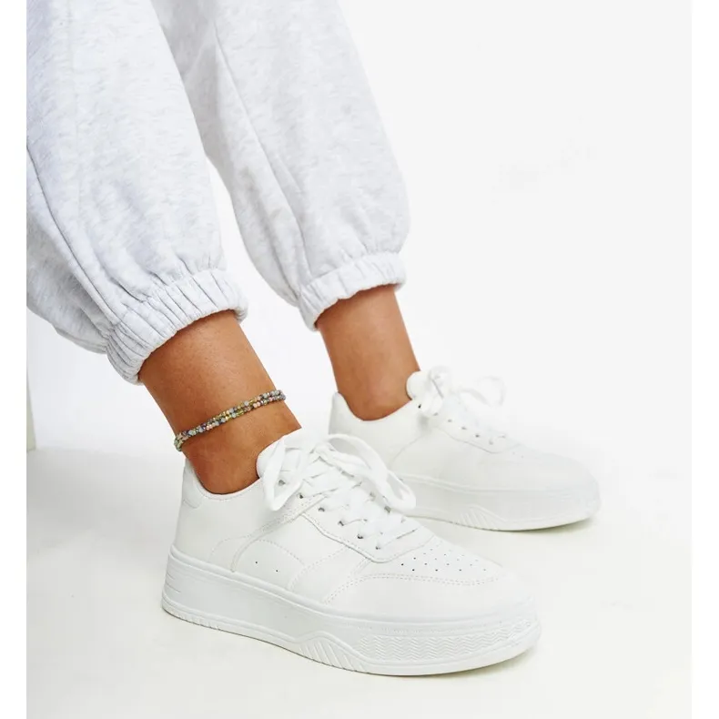 White sneakers with a thick sole from Rafida