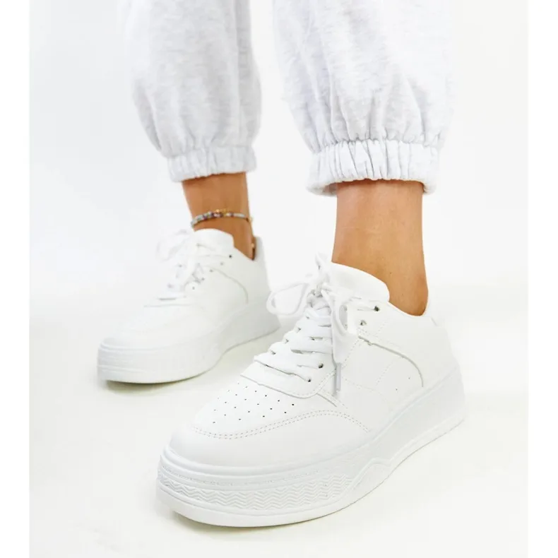 White sneakers with a thick sole from Rafida