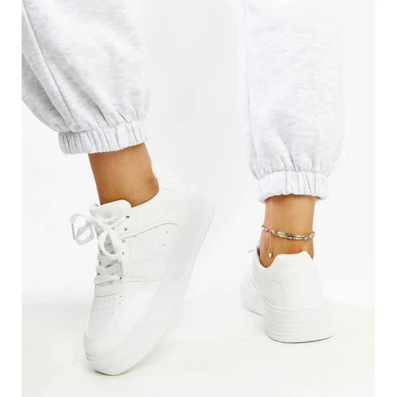 White sneakers with a thick sole from Rafida